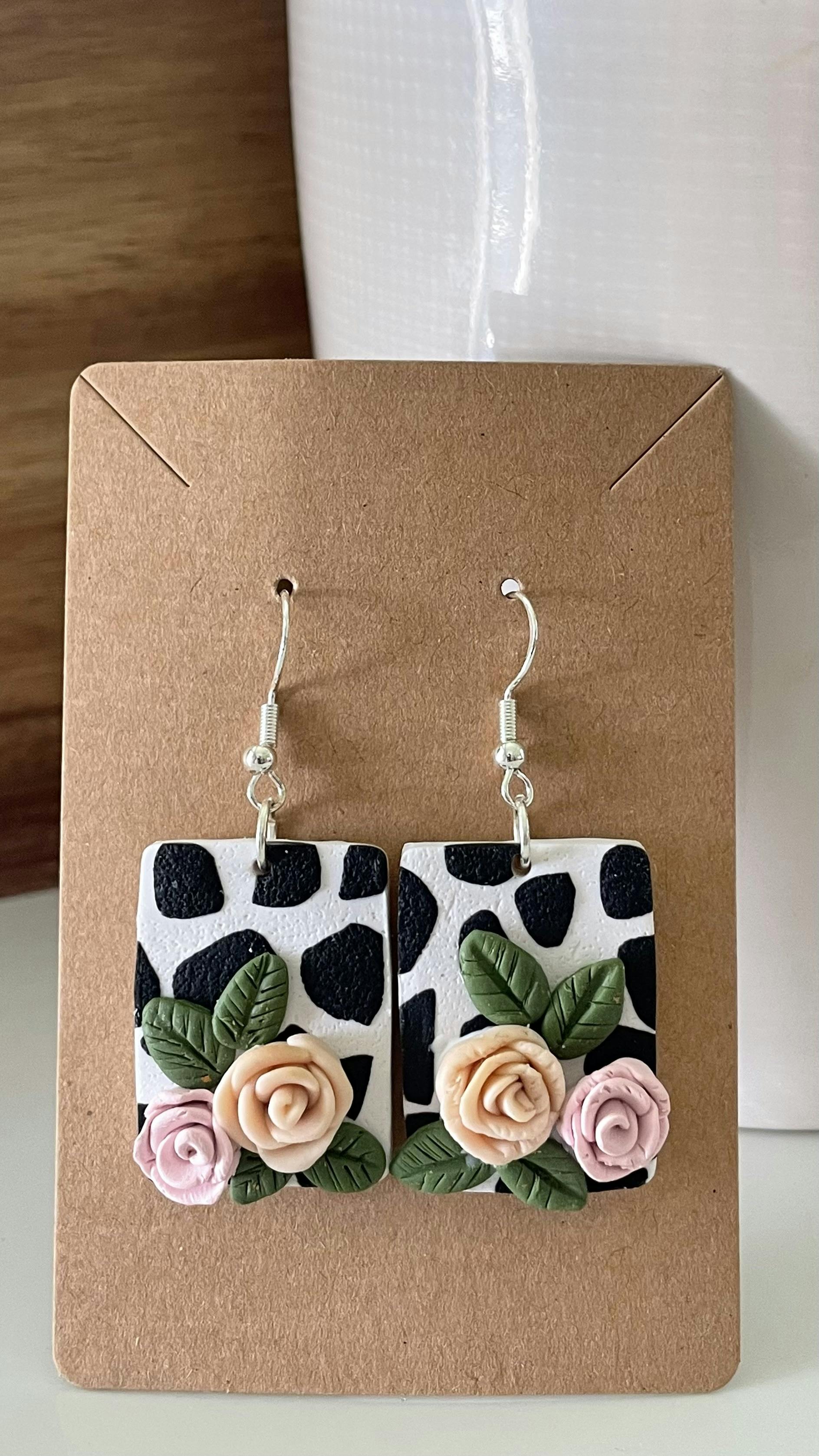 Cow pattern floral earrings