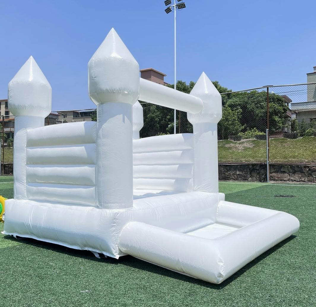 Mini white bounce house with ball pit