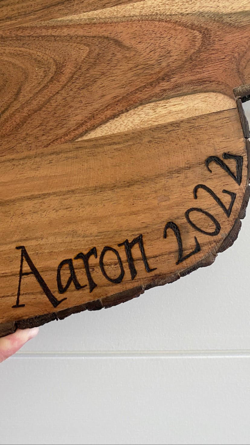 Wood-burned wedding date/name board 