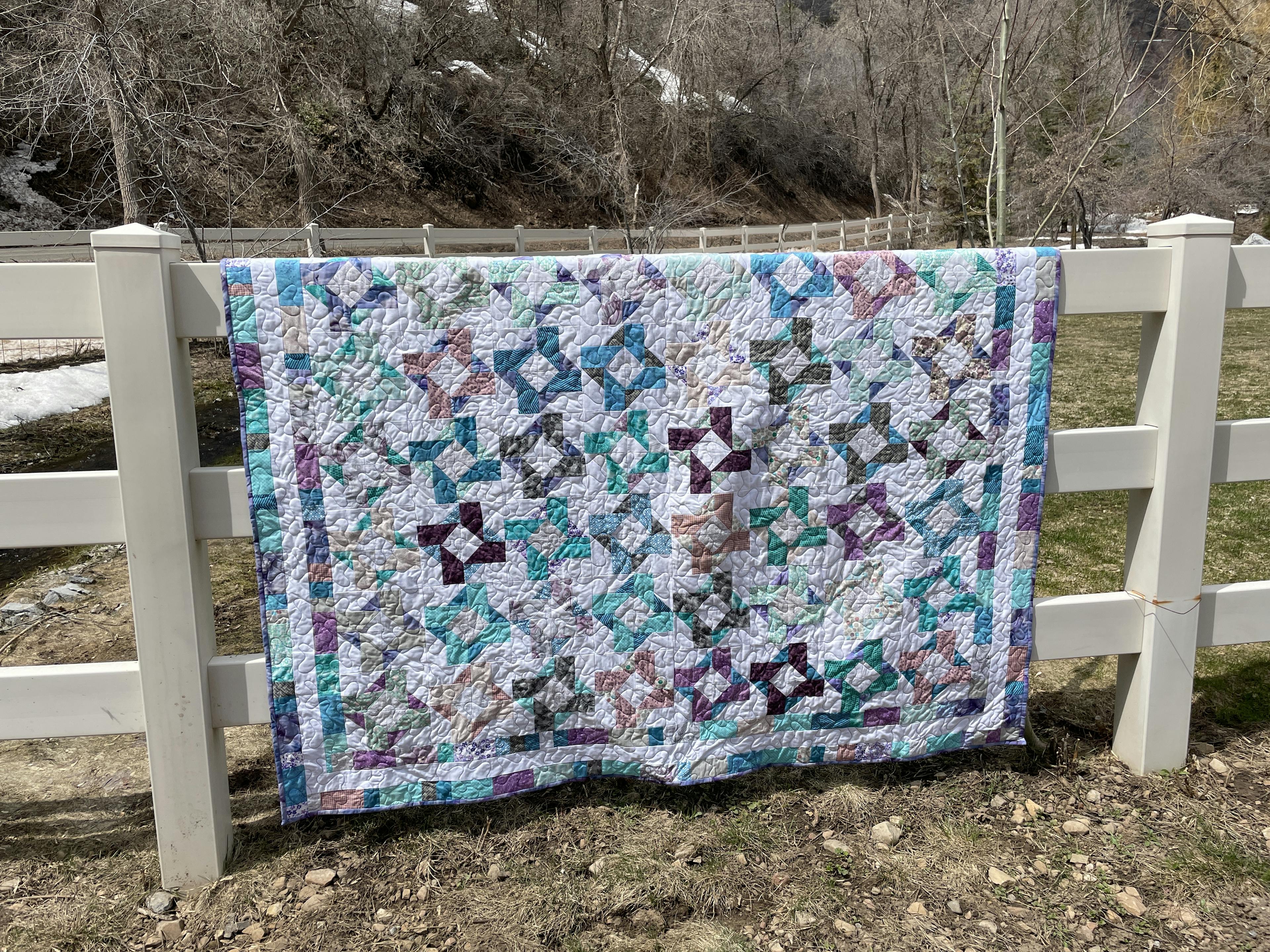 Pieced 65x74” Teal and Purple quilt/blanket.
